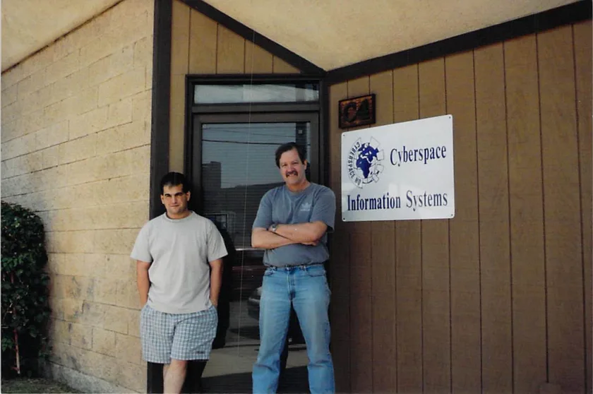 Michael Kovnick and a colleague outside the Cyberspace Information Systems office in 1994